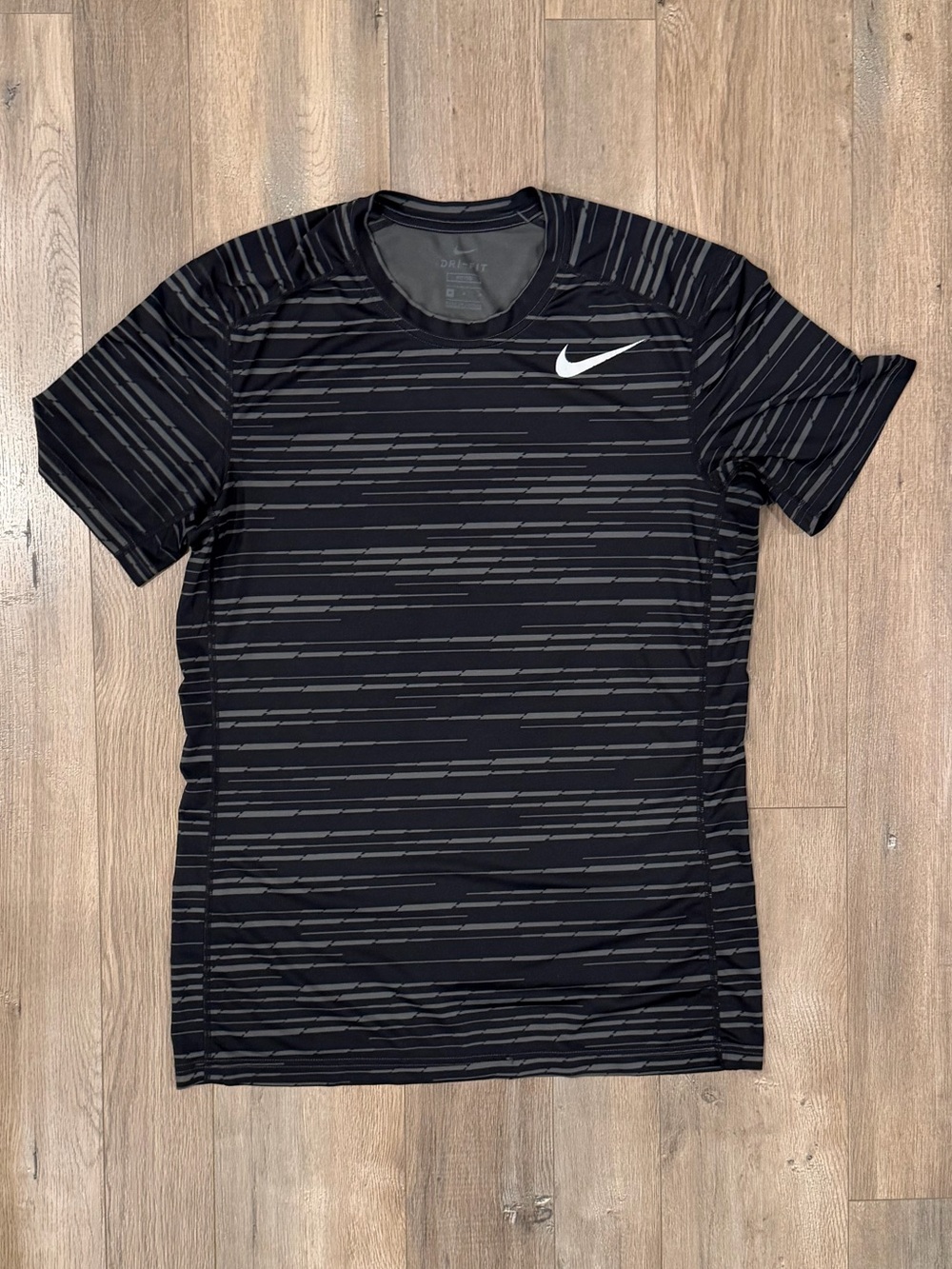 Nike Black Short Sleeve Athletic Tee with Gray Stripes